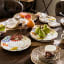 Jenna Clifford Wild Bloom Dinner Plates, Set of 4 on the table