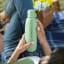 Sodastream Fizz & Go Stainless Steel Bottle, 900ml - Mint handheld showing scale