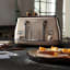 DeLonghi Icona Metallics 4-Slice Toaster, 1800W - Beige with toasted bread