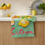 Ulster Weavers Summer Fruits Citron Cotton Tea Towel on the kitchen counter