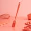 Fusion Twist Silicone Pastry Brush - Coral on the table