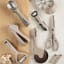 Fusion Twist Garlic Press - Grey with other kitchen tools