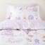 Linen House Squiggles Unicorn Stardust Duvet Cover Set - Double detail on the bed