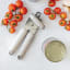 Kitchen Inspire Can Opener on the table with tomatoes