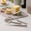 Rosti Emma Cheese Knives Set, 3-Piece - Humus on the table with cheese