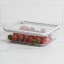 Kitchen Pro Airlock Rectangular Glass Container - 1.5L with strawberries on the kitchen counter