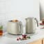Kenwood Eterna 2-Slice Toaster, 930W - Beige with a kettle on the kitchen counter