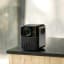Wanbo Mozart 1 Pro Smart Home Theatre Projector, 1080p on the table