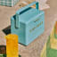 Fieldbar Mini Bar, 4L - Bazaruto Blue by the pool with a book and a cocktail
