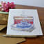 Growing Paper Coffee and Books Greeting Card on the table