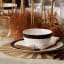 Mikasa Round Gold Placemats, Set of 4 with a dinner set
