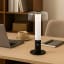 Arc & Hue Arcis Portable & Rechargeable LED Lamp - Black on a desk