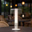 Arc & Hue Arcis Portable & Rechargeable LED Lamp - Cream on a dinner table