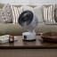 Meaco Sefte Portable Rechargeable Air Circulator Desktop Fan on a coffee table