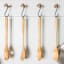 KitchenAid Birchwood Utensils, Set of 4 on a kitchen hanger