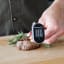 KitchenAid Instant-Read Pivoting Digital Thermometer measuring meat temperature 