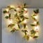 Talking Tables Holly Christmas LED String Lights, 2.2m on the wall