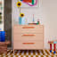 Popstrukt Sprinkles Chest of Drawers - Peach Pop with sunflowers in a vase