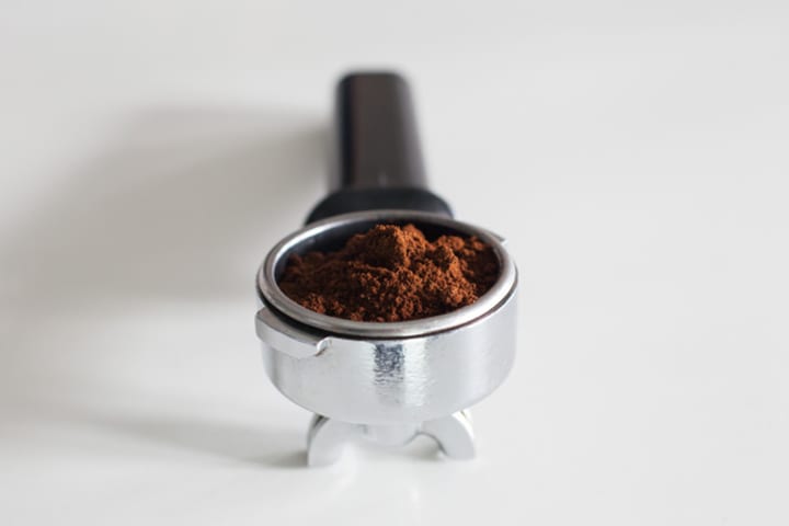 Ground coffee in basket