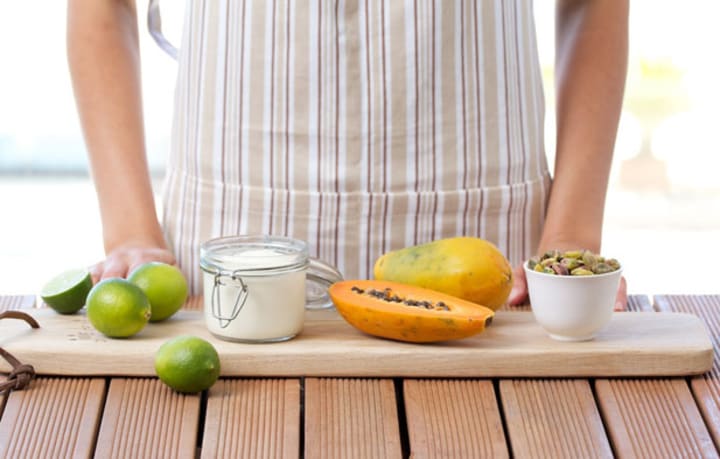 Papaya, limes and pistachio nuts for Papaya, lime, Bulgarian yoghurt, and pistachio nut medley recipe