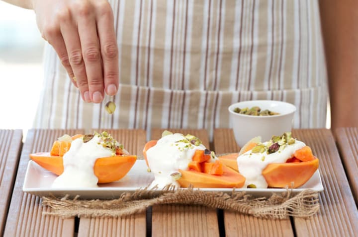 Papaya, lime, Bulgarian yoghurt, and pistachio nut medley