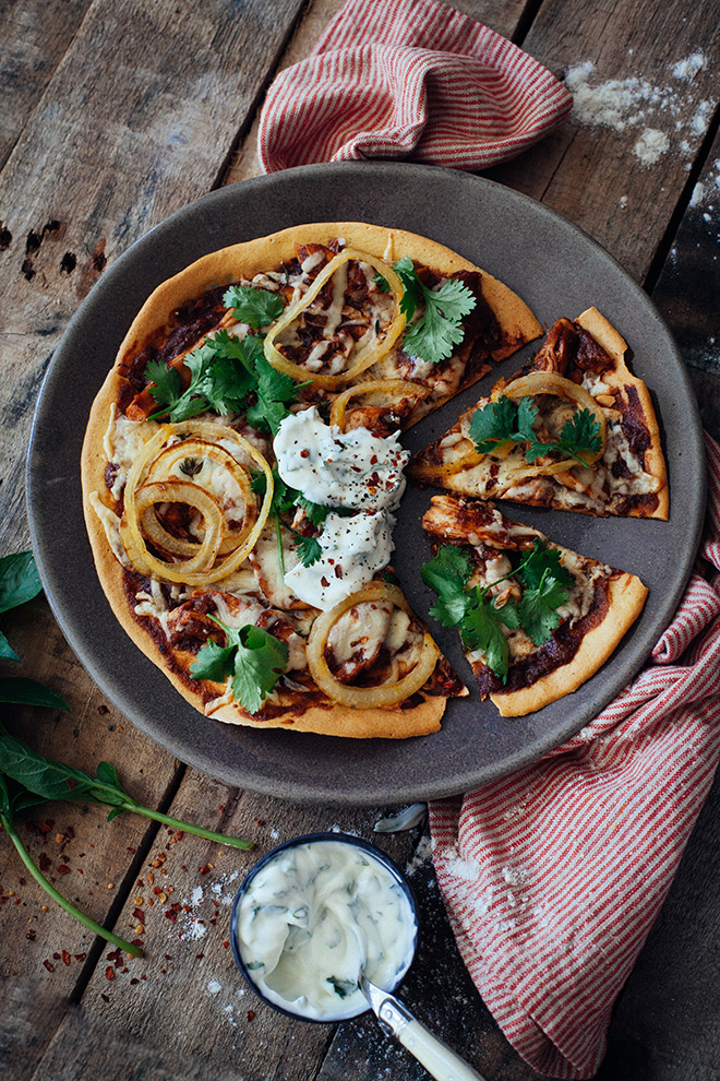 Turmeric butter chicken on a homemade chickpea pizza crust