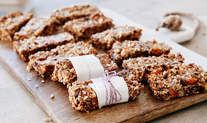 Healthy Oats Chocolate And Seed Granola Bars Gently heat the sugar, goldensyrup and butter in a pan until the sugar and butter have both melted.stir the oats, raisins, walnuts, seeds and cranberries into the pan untilcoated in the butter. seed granola bars