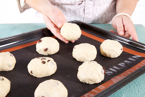 rolled balls of hot cross buns