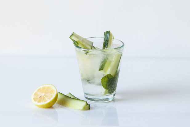 Gin and tonic cocktail with cucumber