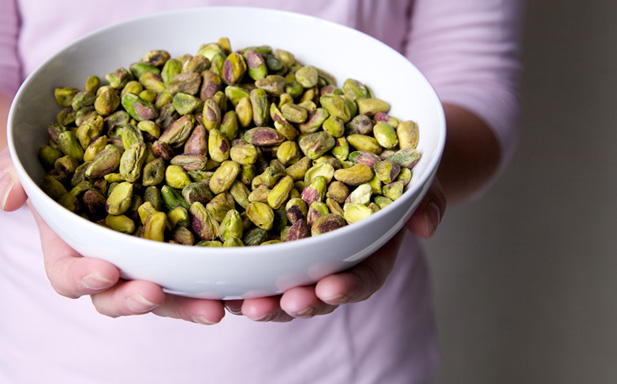 A bowl full of pistachios