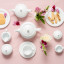 Noritake Arctic White Creamer Jug with a teapot, cup of tea and side plate with cookies