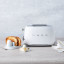 Smeg Retro 2 Slice Toaster - Matt White in use front view