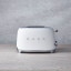 Smeg Retro 2 Slice Toaster - Matt White lifestyle front view