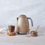 Smeg Retro Kettle, 1.7L - Matt Champagne lifestyle front view