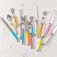 Laguiole by Andre Verdier Steak Knife & Fork Set, 12-Piece different colours on the kitchen counter