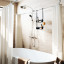 Umbra Flex Shower Caddy - Black In A Bathroom setting 