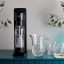BIBO Fizz Bar Sparkling Drink Maker - Black with glasses on the table