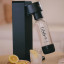 BIBO Fizz Bar Sparkling Drink Maker - Black with glasses on the table