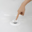 Umbra Flex Drain Cover - White in the bathtub