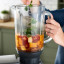 Kenwood Chef & Chef XL Stand Mixer Glass Blender Attachment with veggies and other ingredients 