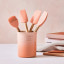 Le Creuset Peche Utensil Set, 5-Piece on the table