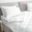 Fine Fibre Premium Medium Firm Pillow on the bed