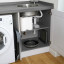 MasterClass Smart Space Collapsible Laundry Basket in a cupboard
