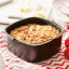 Philips Bake Master Accessory Kit for XXL Airfryer with mixed ingredients in the bake master