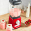 Magimix Power Jug Blender, 1.8L - Red on the table