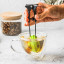 Dreamfarm Teafu Tea Infuser - Green in a cup of tea