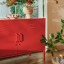 Popstrukt Sugar Cube Media Unit - Red Polka with decorative books and vases
