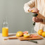 Eva Solo Green Tool Citrus Press with a grapefruit