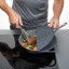 MasterClass Smart Space Silicone Folding Splatter Guard, 30cm on a pan with food