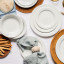 Noritake Arctic White Dinner Set, 16-Piece on the table